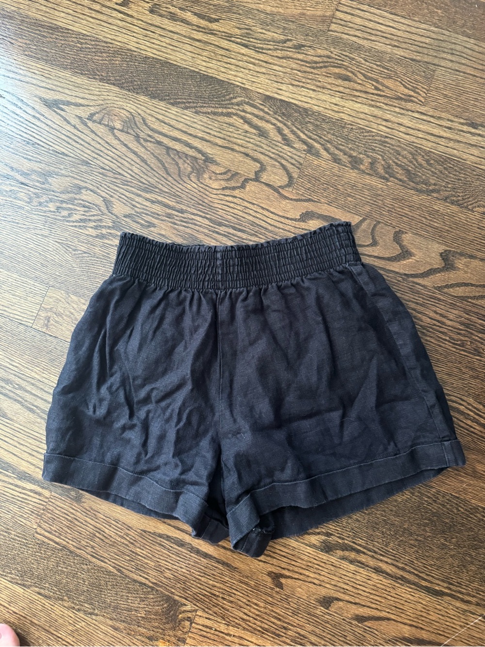 Reformation Navy High-Waist Smocked Linen-Blend Shorts